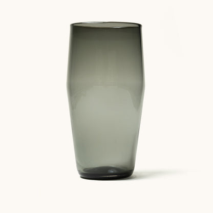 Standard Pint Glass in translucent smoky grey, standing upright with a subtly flared shape.