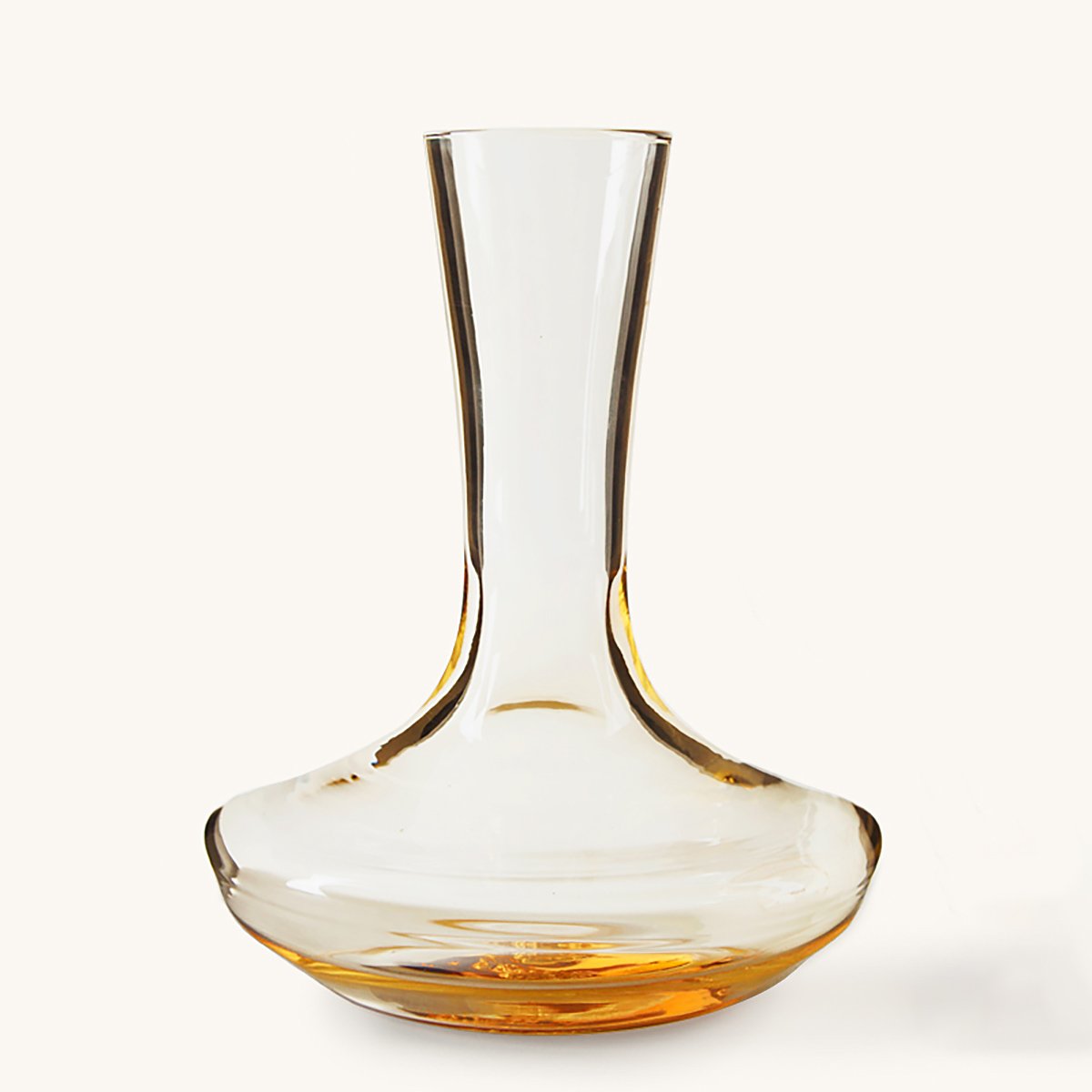 Amber glass decanter with a tall, narrow neck and a wide, flat base.