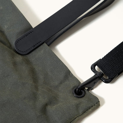 Juniper Green Waxed Canvas Simple Tote with black leather strap and metal hardware detail.